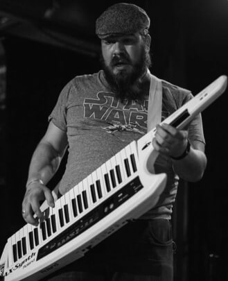 Vocal Teacher, Keyboard + Piano Teacher Dewey Reikofski