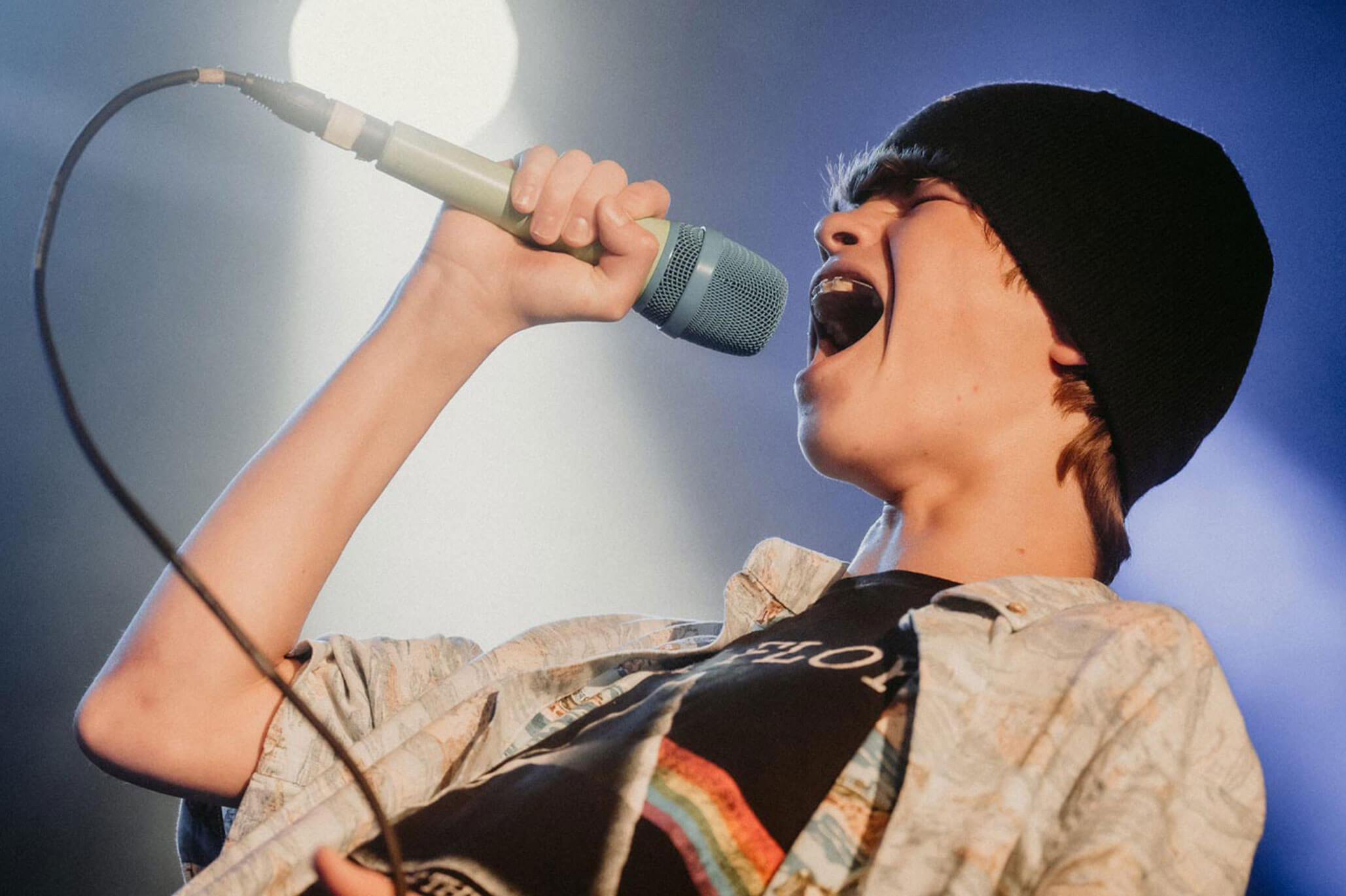 A kid vocalist singing